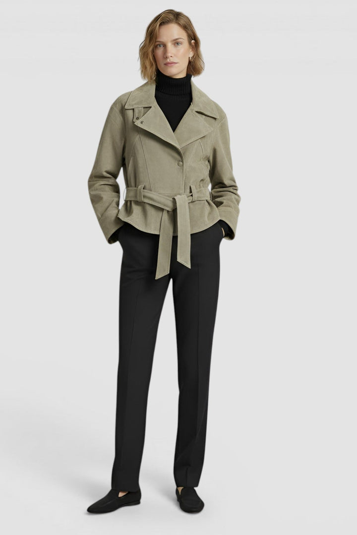 ADELINE - Model wearing greenish-tan suede belted jacket and black trousers