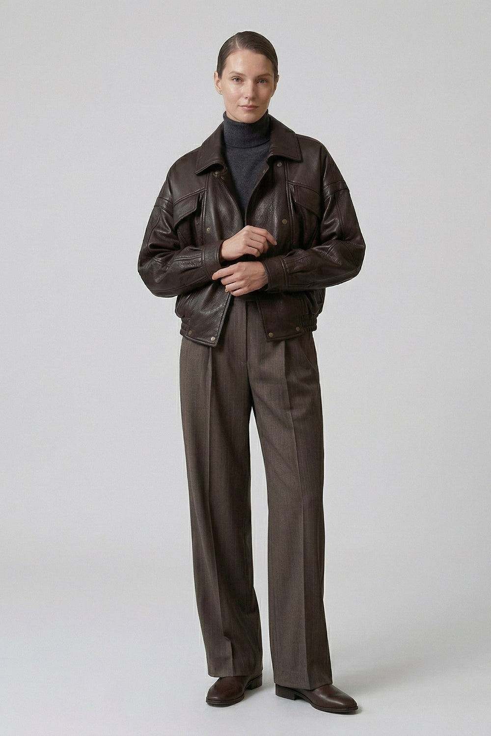 AINSLEY - Woman in Dark Brown Leather Jacket and Trousers
