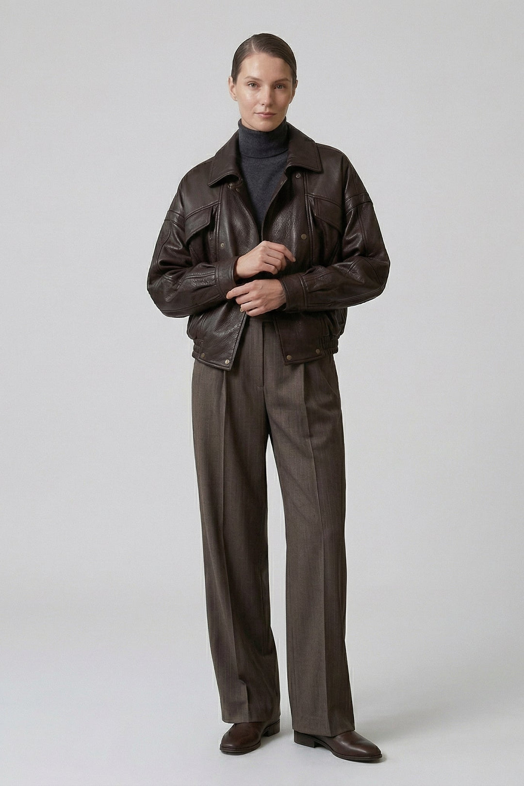 AINSLEY - Woman in Dark Brown Leather Jacket and Trousers