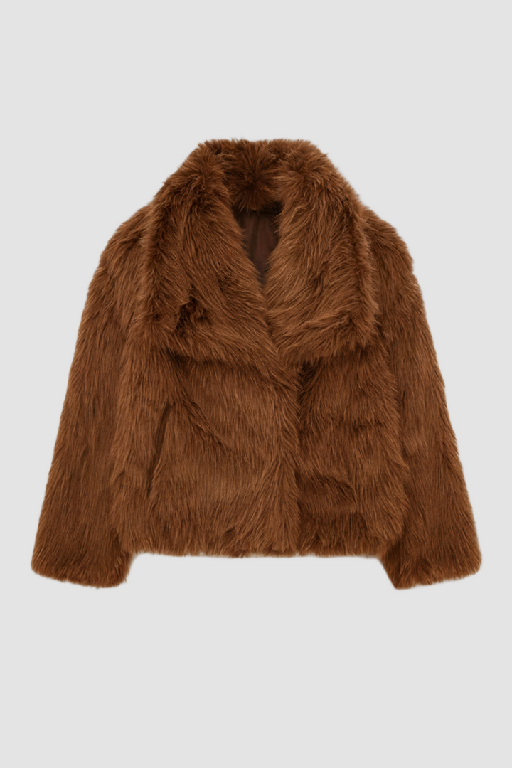 Brown fur coat on a white background