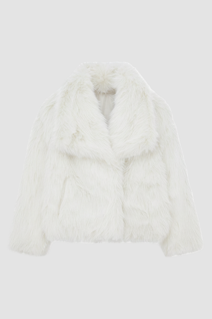 White fur coat on a white background