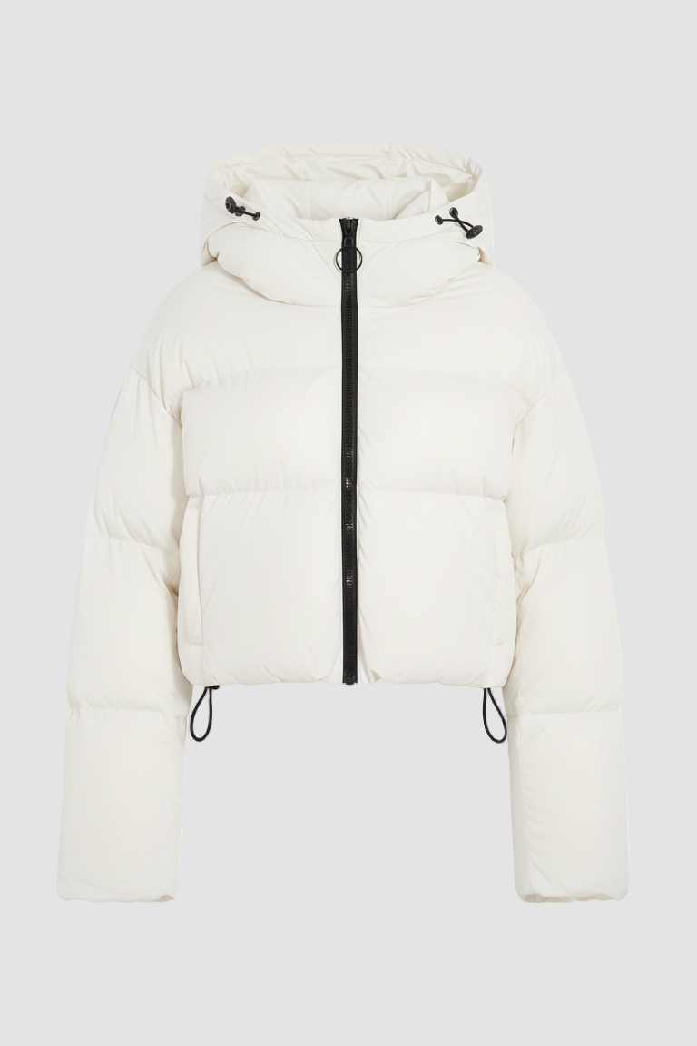 White puffer jacket with a black zipper on a white background