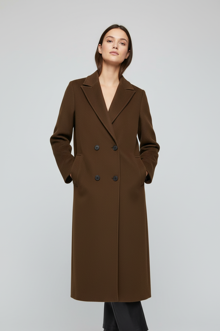 Woman wearing a brown coat on a white background