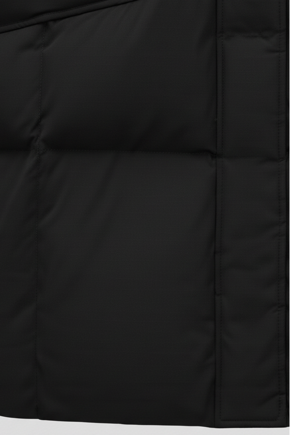 A close-up shot of a warm, cozy down coat with a snug hood.