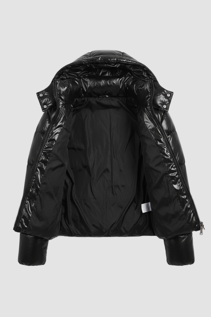 Black puffer jacket with a hood on a white background