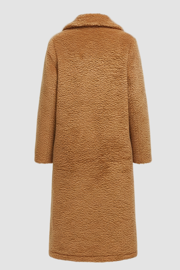 Back profile of the TALYNE long teddy coat highlighting thick warm construction and pockets.