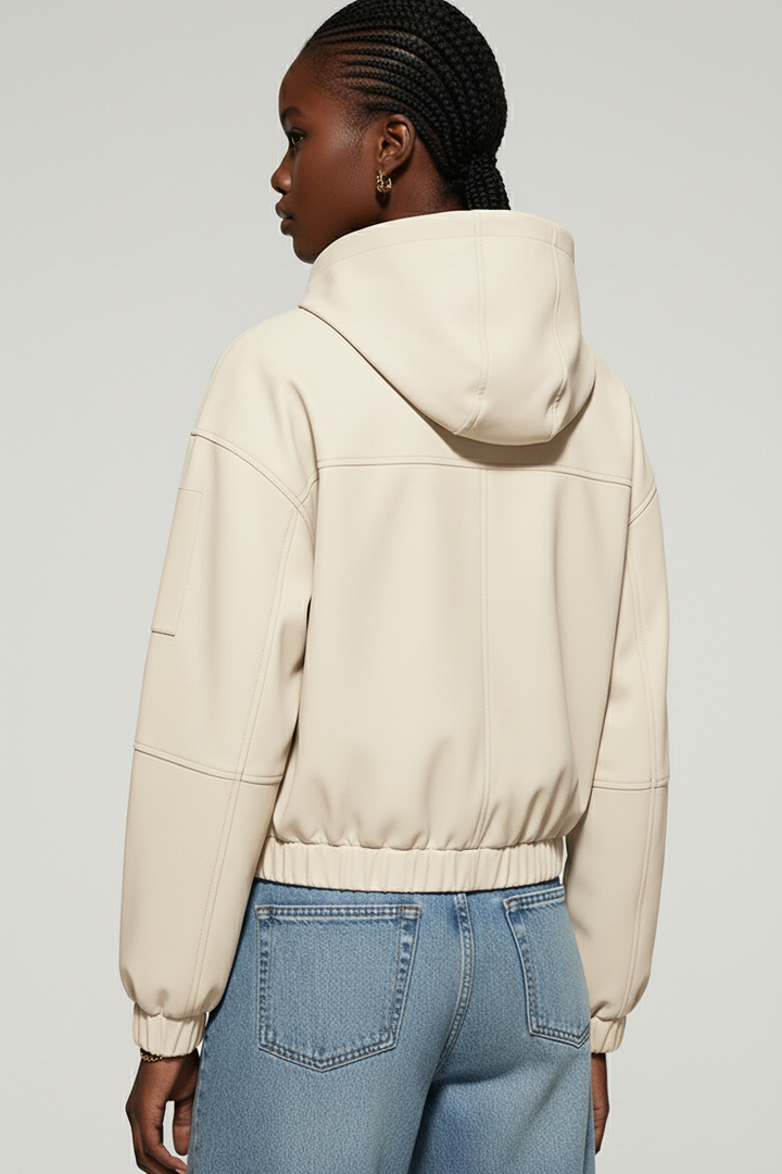 Back view of the MAERIS trench coat BEIGE featuring hood design and clean lines.