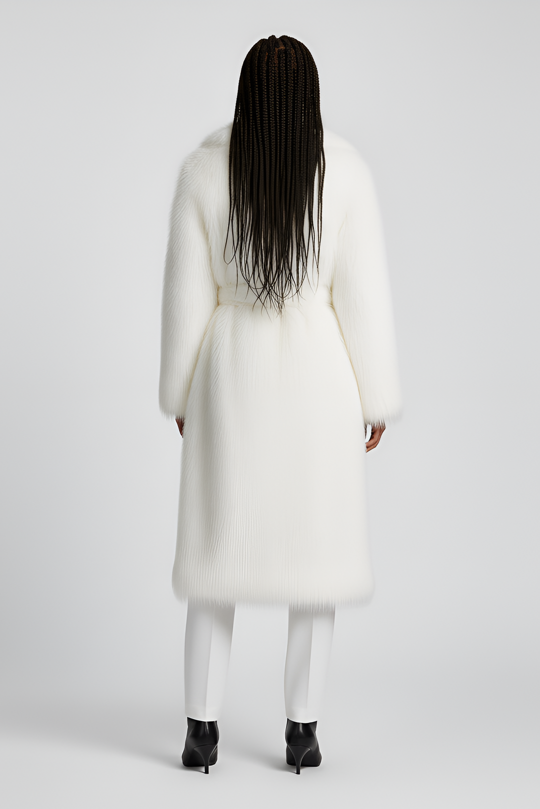 Back view of the MARZELA coat showing its flowing long-length design.