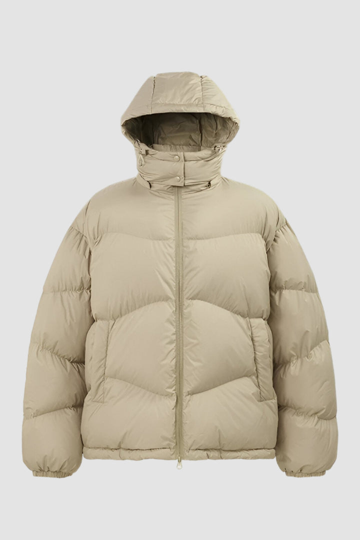 Beige puffer jacket with a hood on a white background