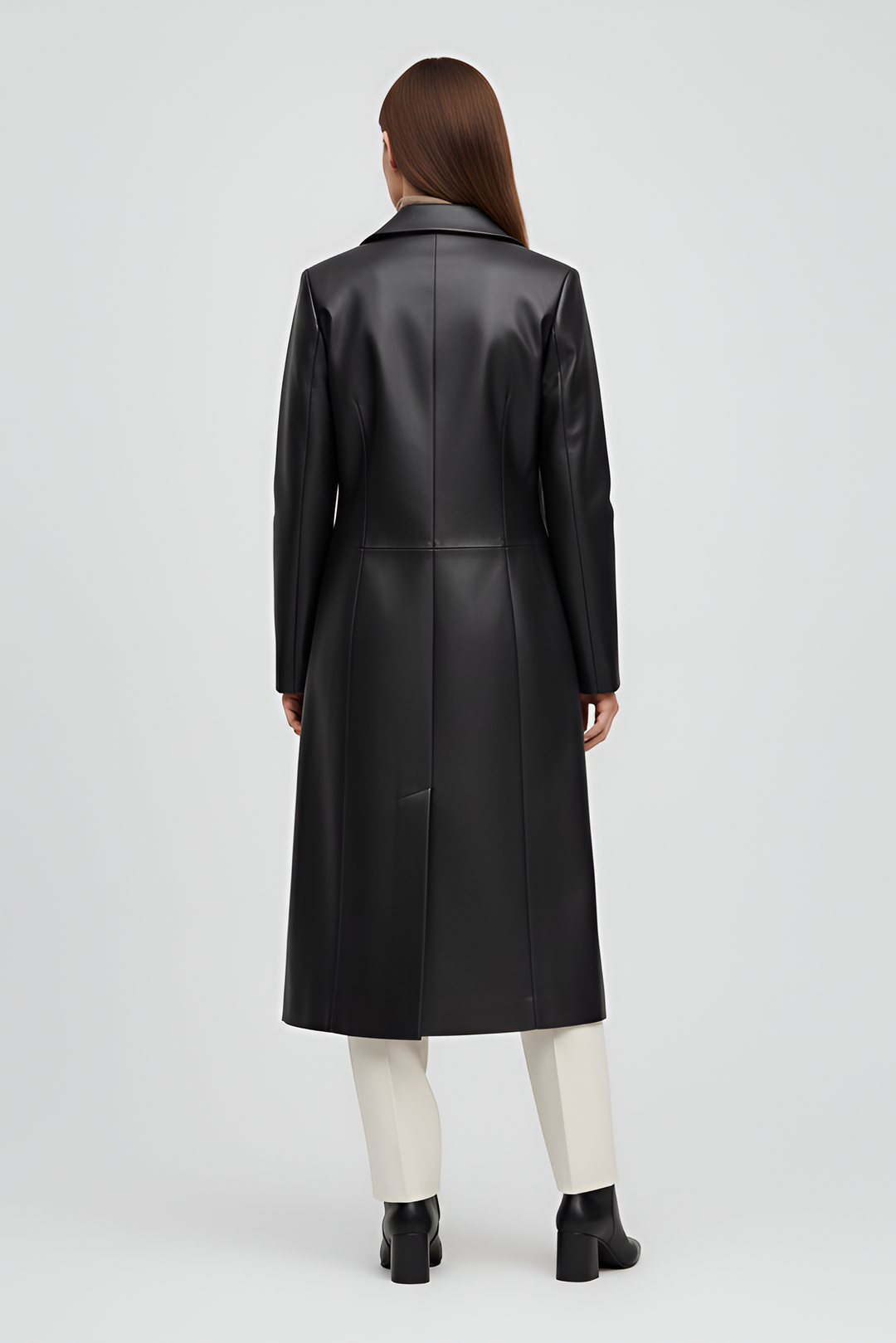 Black faux leather overcoat for women with discreet pockets and elegant streamlined shape