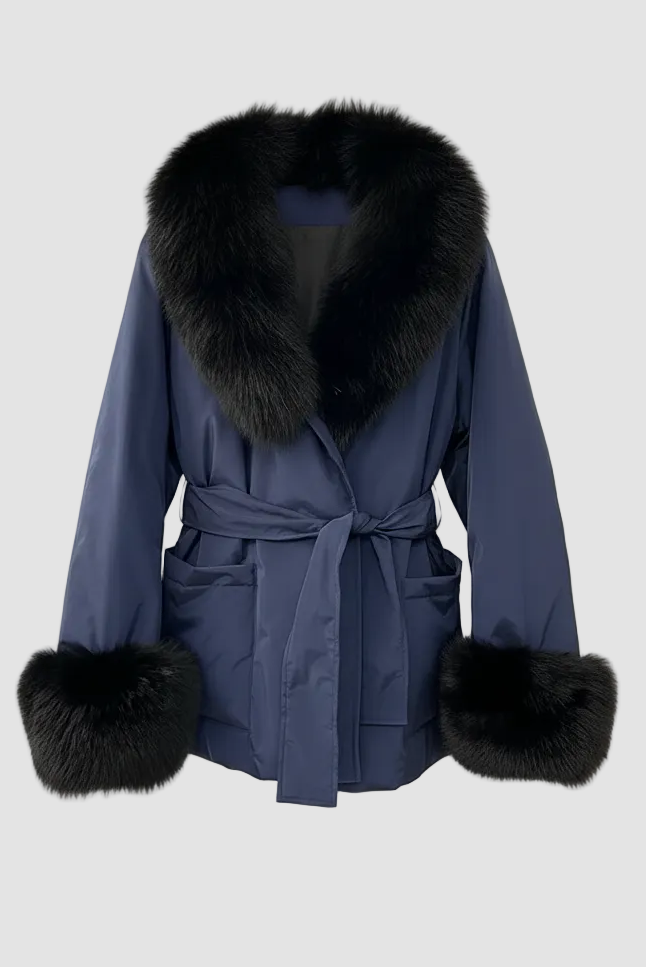 Blue coat with black fur trim on a white background