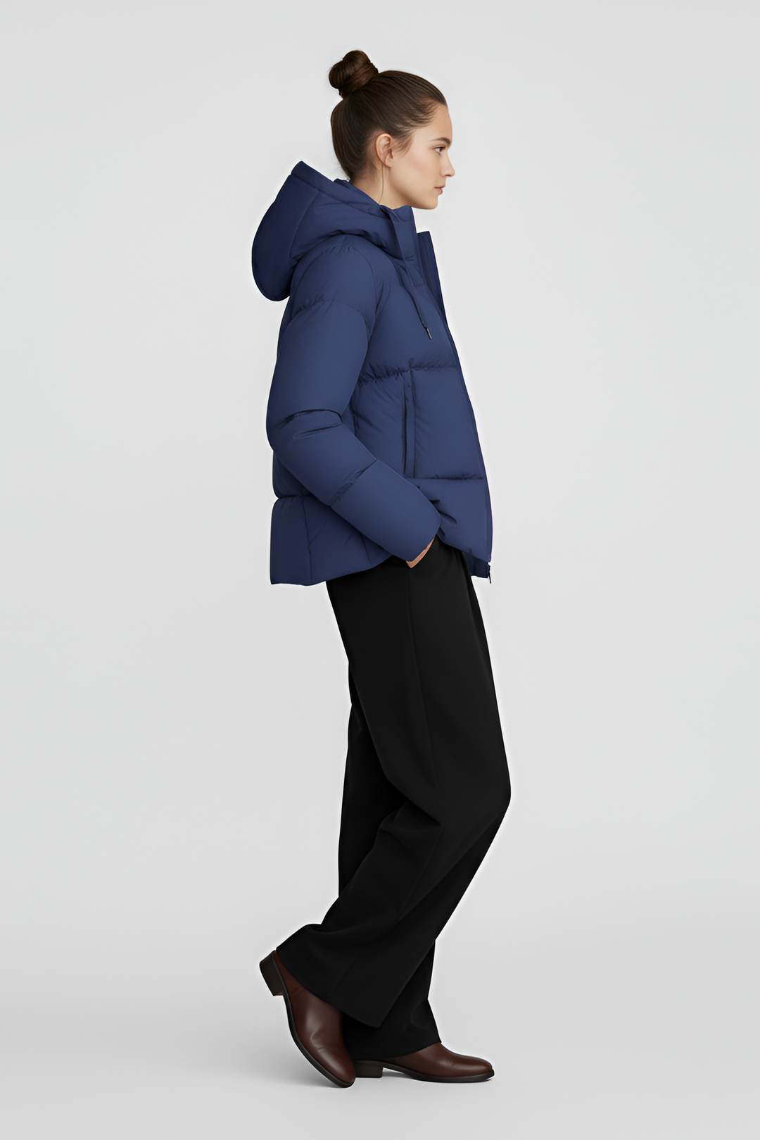 Blue puffer jacket on a light gray background