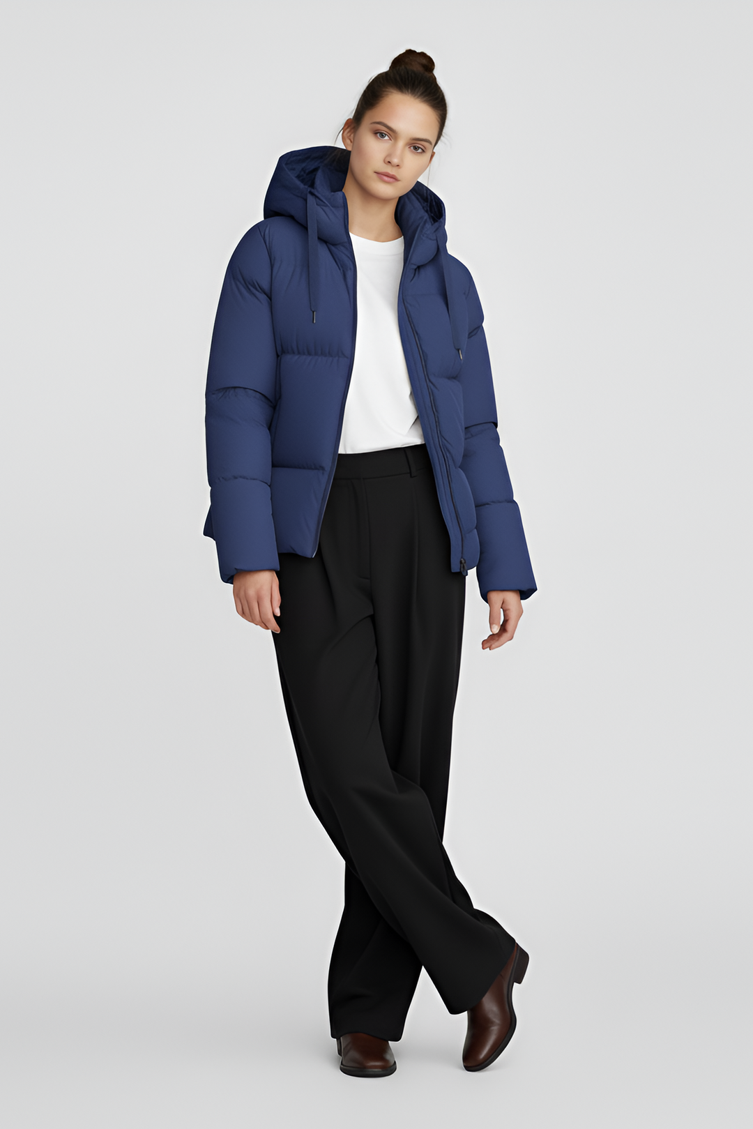 Blue puffer jacket on a light gray background