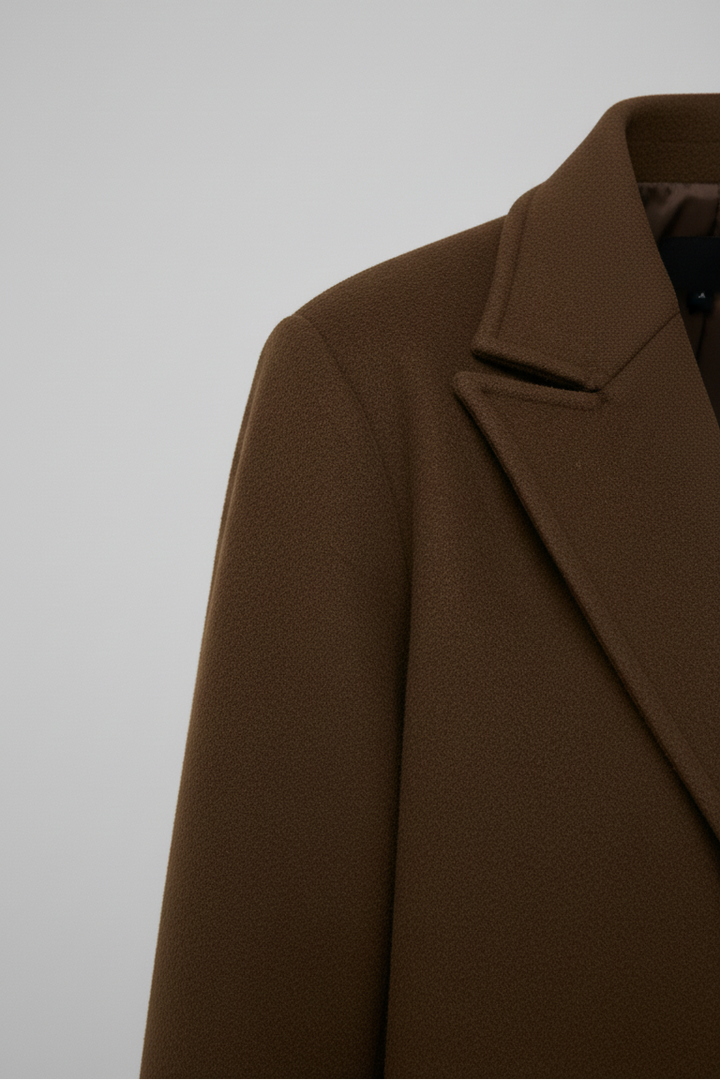 Brown coat on a light gray background