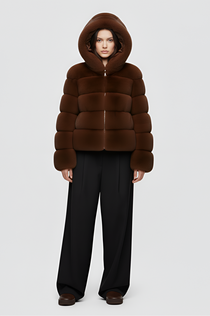 FERALYN faux fur jacket photographed outdoors in natural winter light.