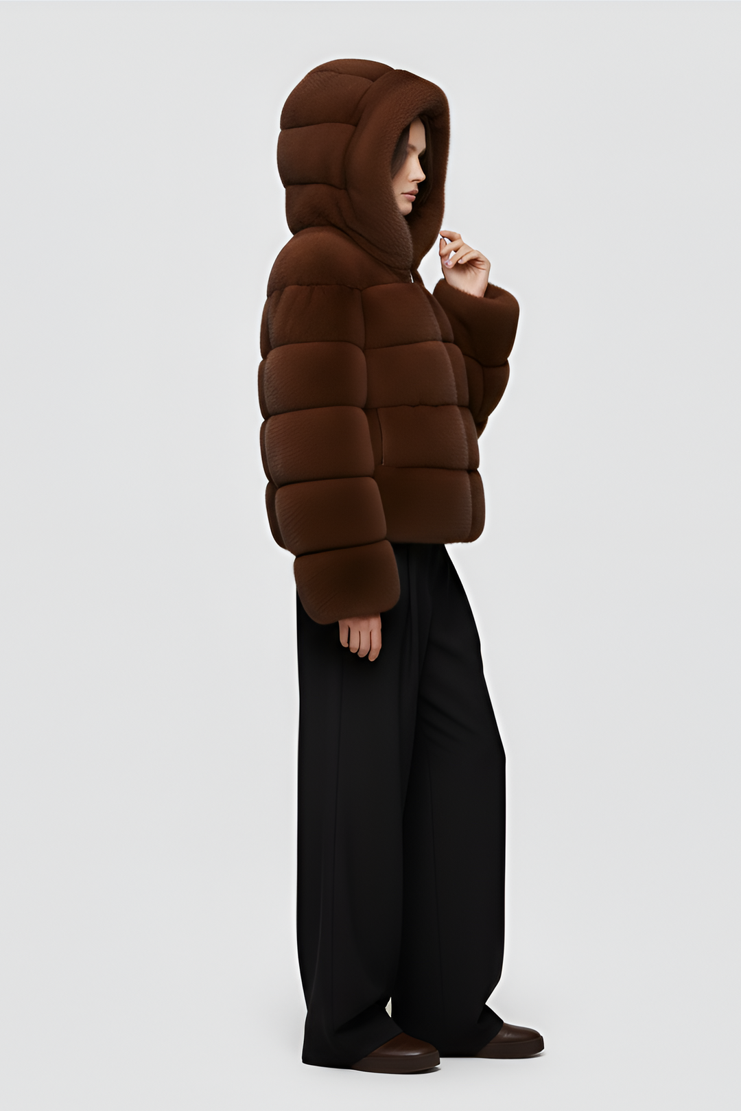 FERALYN faux fur jacket photographed outdoors in natural winter light.