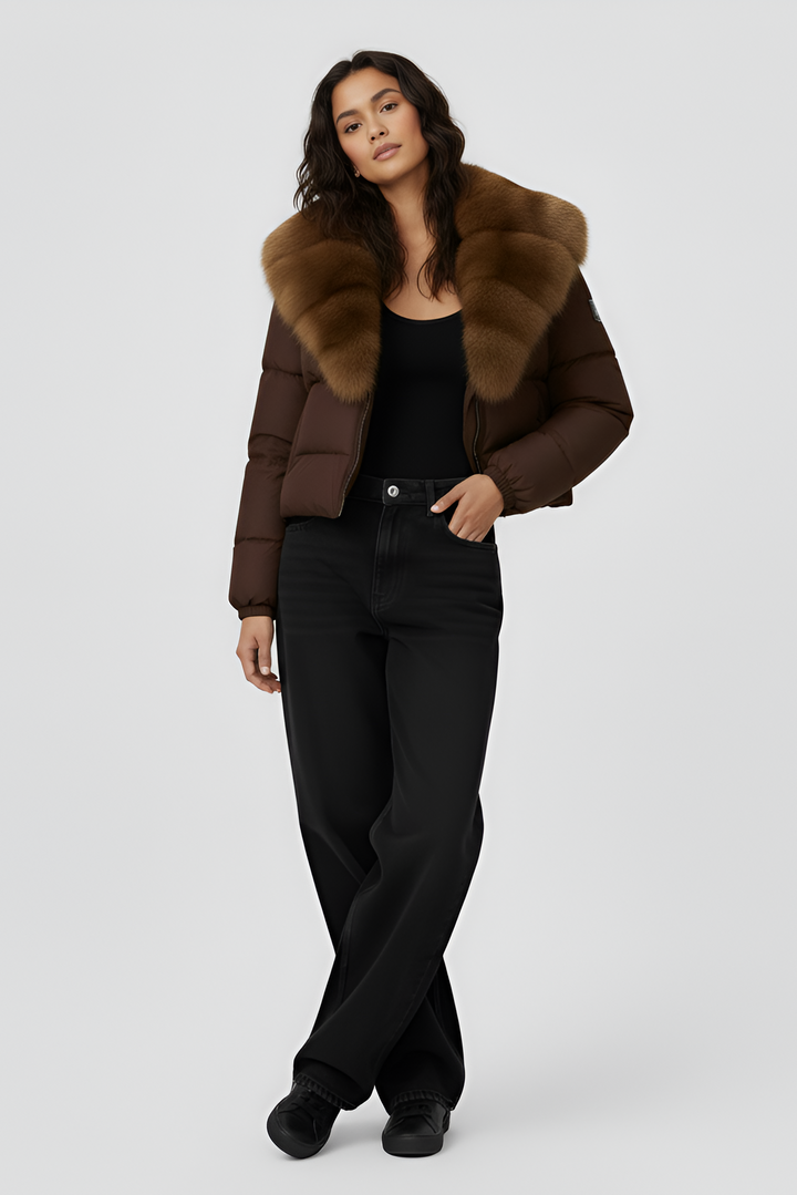 Brown puffer jacket with fur collar on a light gray background