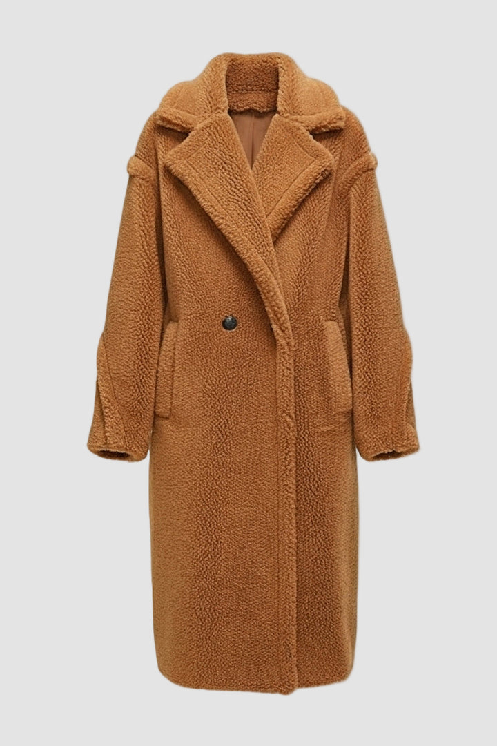 Brown teddy coat on a light gray background