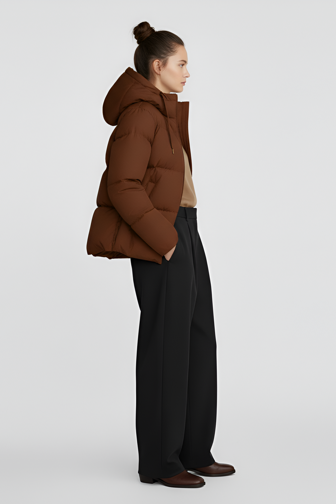 Brown puffer jacket on a light gray background