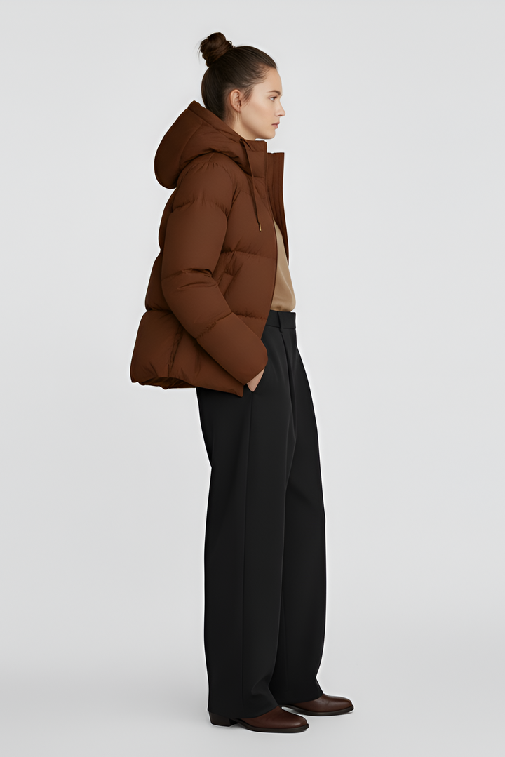 Brown puffer jacket on a light gray background