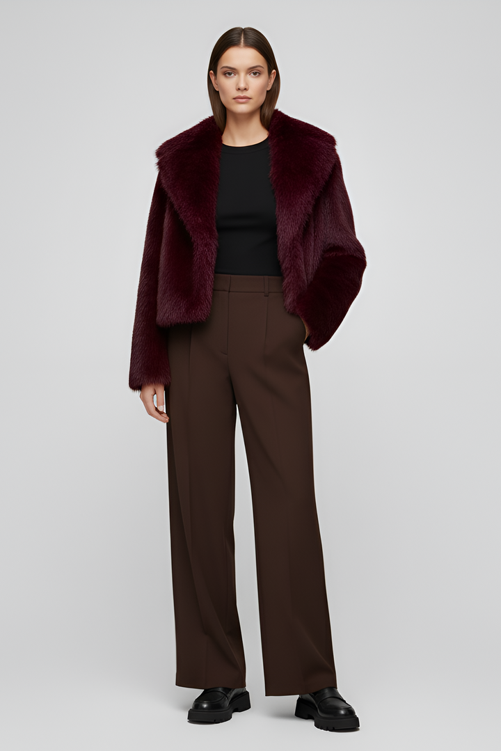 Detailed front view of the Camelia faux fur winter coat in deep burgundy, highlighting its rich texture and satin inner lining.