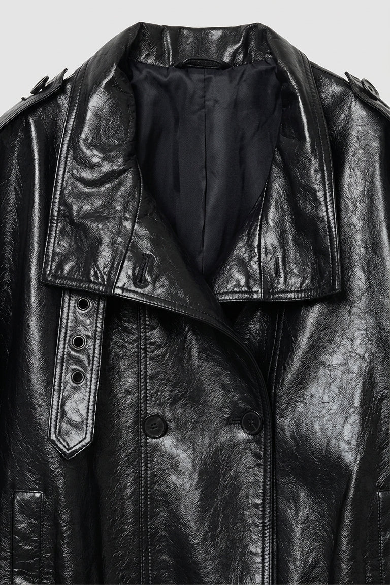 CLAUDINE - Black leather jacket on a light gray background