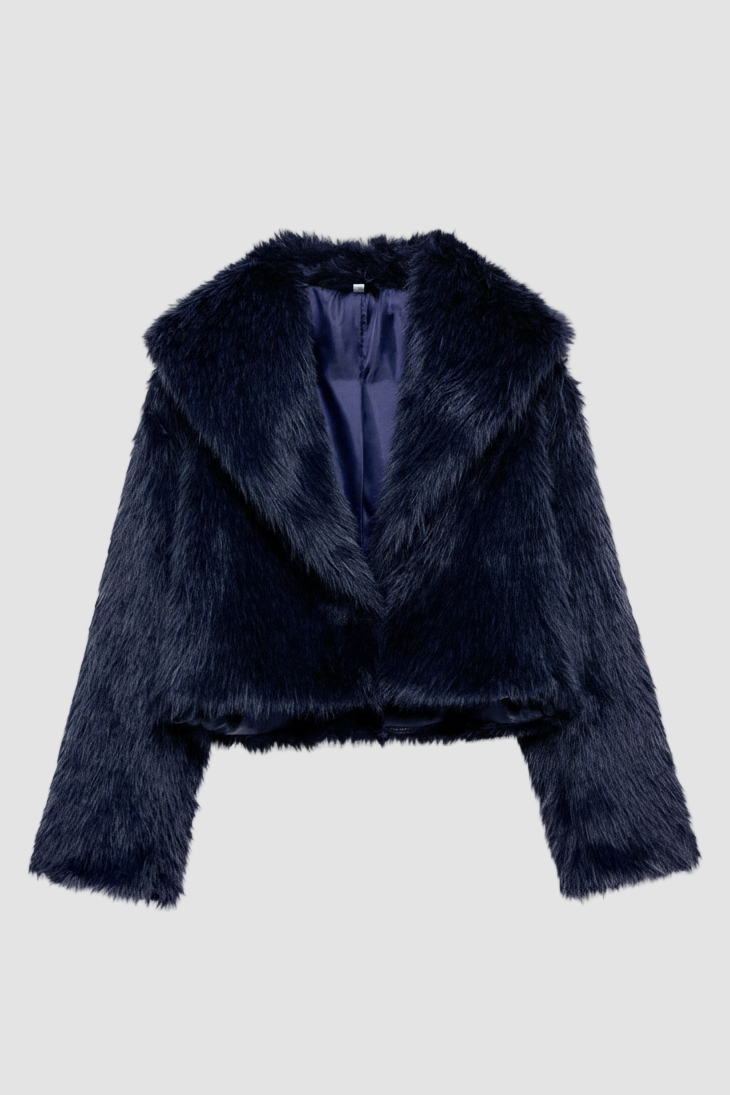 Camelia faux fur winter coat in midnight navy blue, designed with a cozy texture and stylish cropped silhouette.