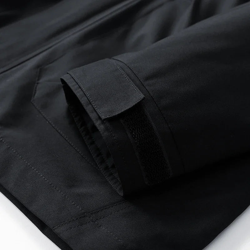 Close-up of a black jacket with a pocket on a white background