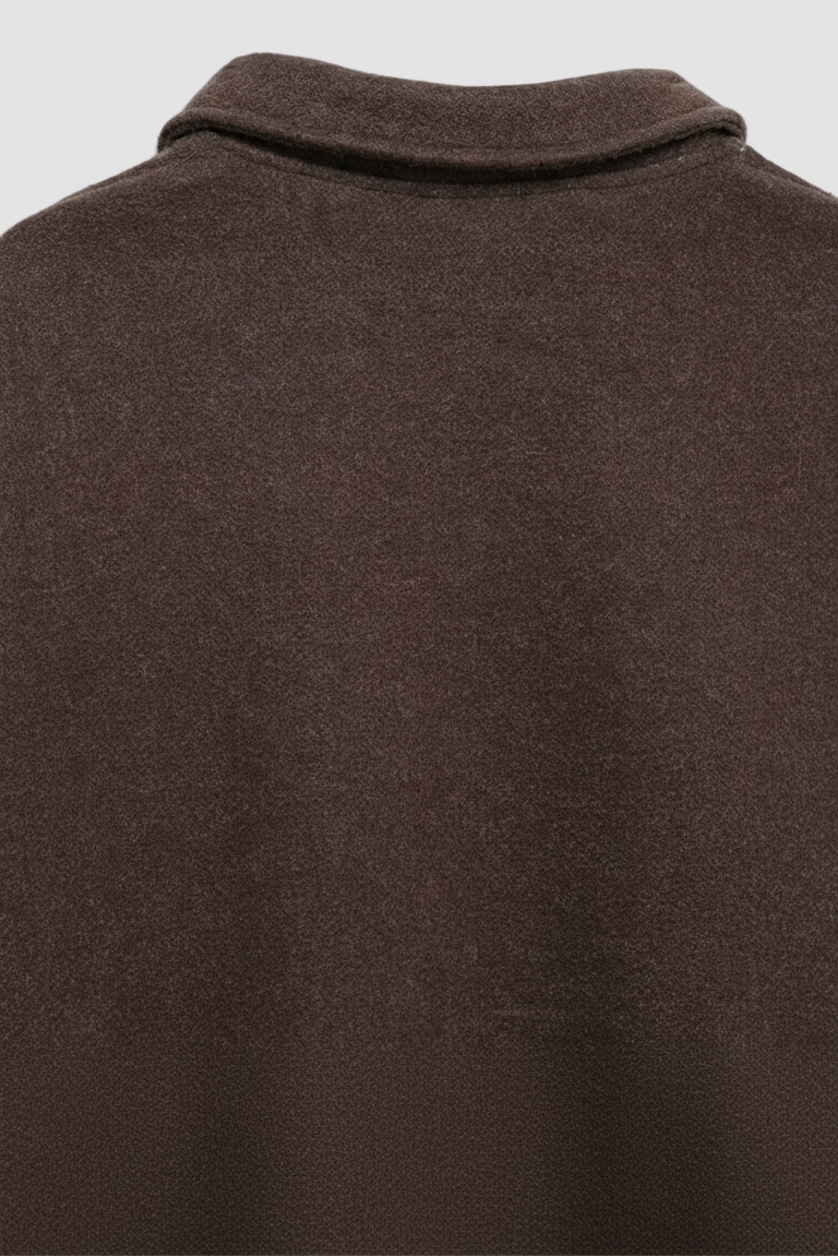 Close-up of a brown jacket with a collar on a white background