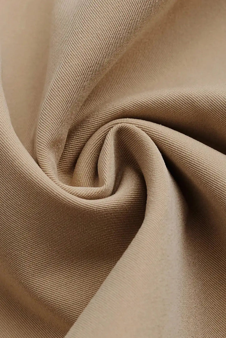 Close-up of beige fabric with a subtle texture