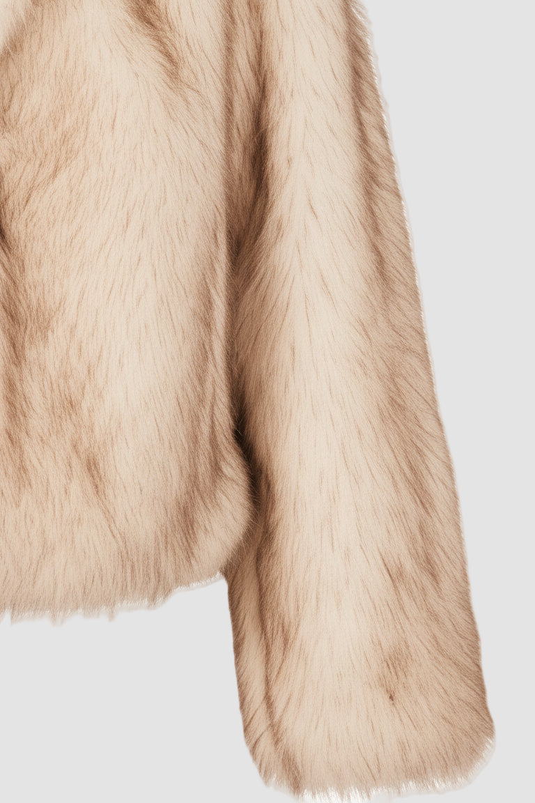 Close-up of beige fur texture on a white background