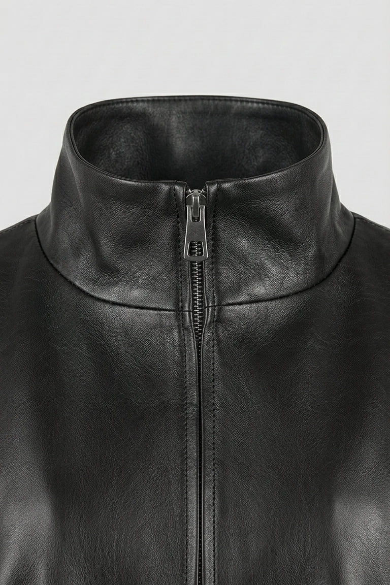 DELILAH - Black leather jacket, close-up on collar and zipper