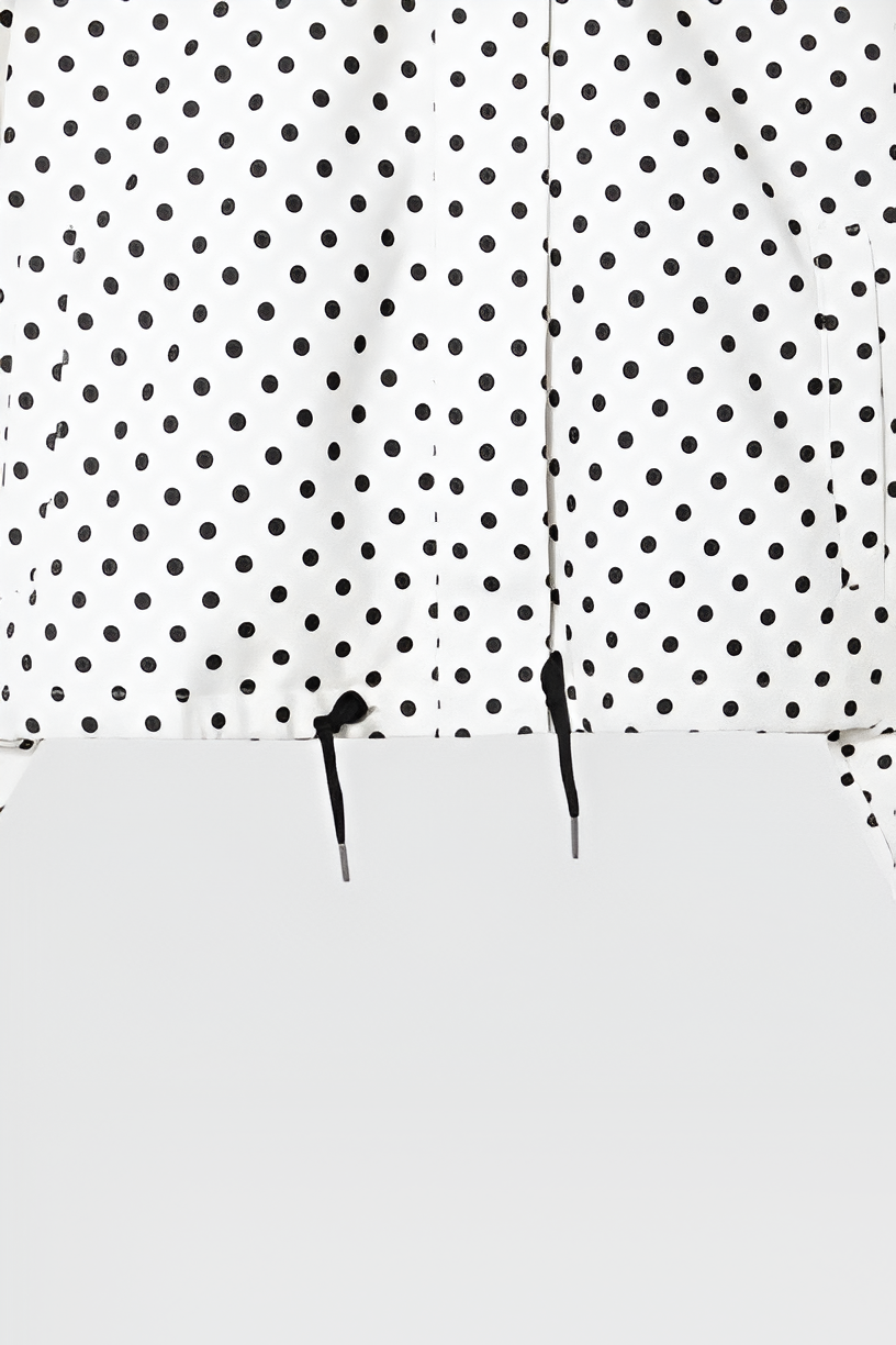 Dalvyn bomber jacket – a white cropped bomber jacket featuring black polka dots and a sleek, minimal back panel design.