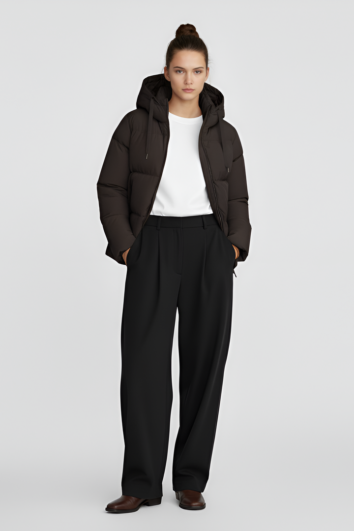 A brown puffer jacket against a light gray background.