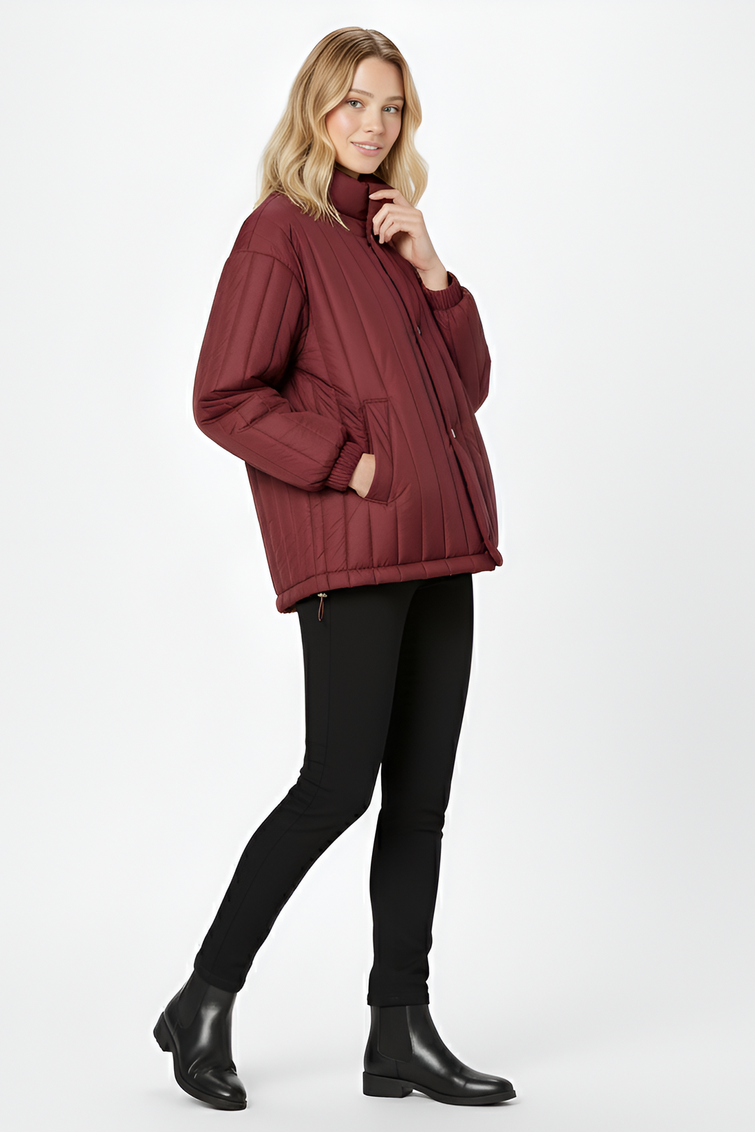 Discover the NARVINA lightweight puffer jacket for women, crafted with breathable duck-down warmth, a clean stand collar, and minimalist quilted design.