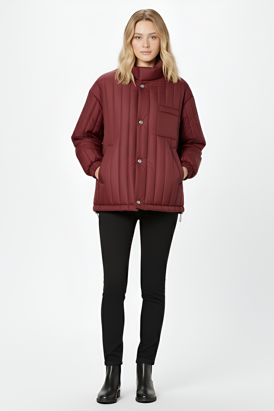 Discover the NARVINA lightweight puffer jacket for women, crafted with breathable duck-down warmth, a clean stand collar, and minimalist quilted design.