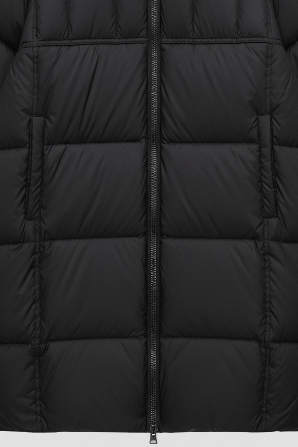Close-up of a black puffer jacket on a light gray background
