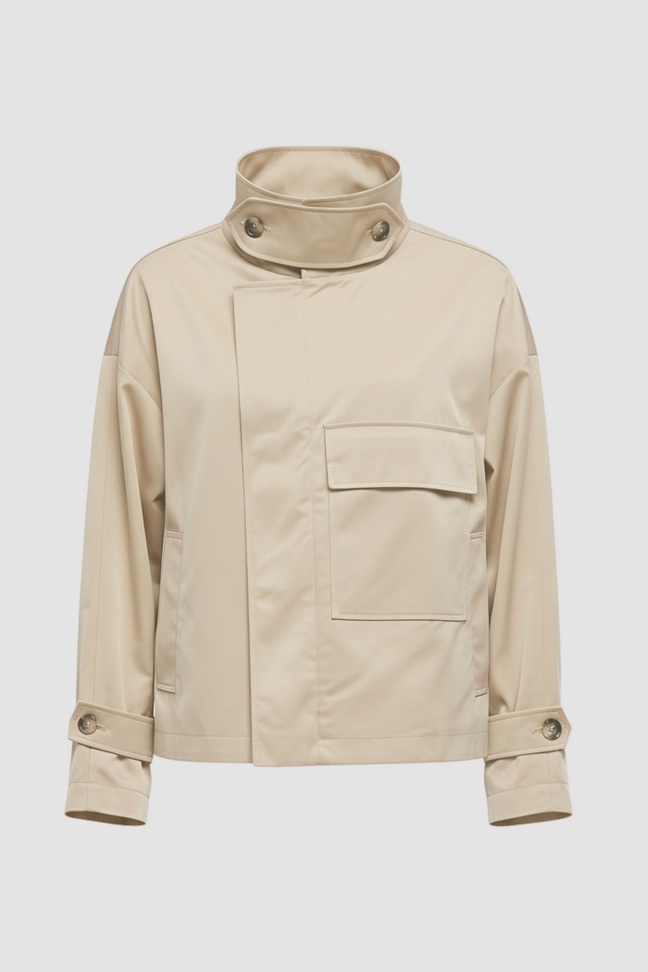 Back view of ENVARA waterproof trench coat showing long silhouette and clean seams.