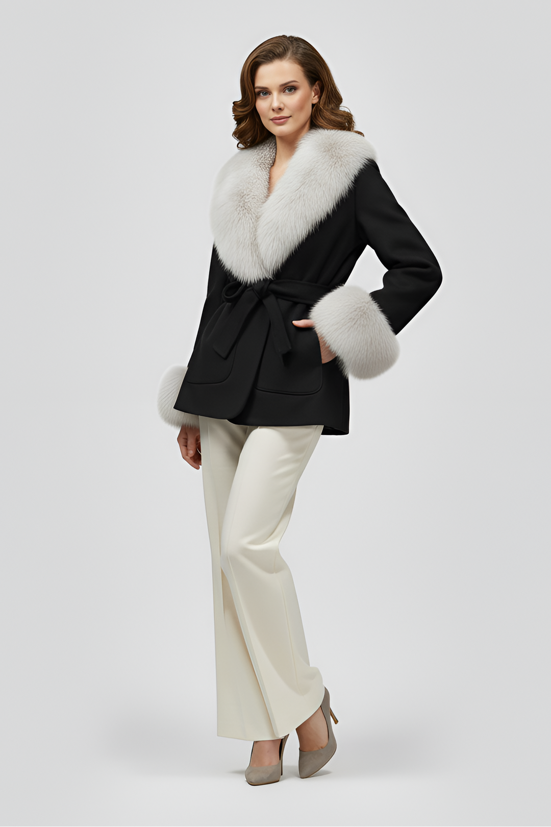 Elegant black faux fur coat for women with belted waist and light fur trim, three quarter view showing refined silhouette and luxury winter style