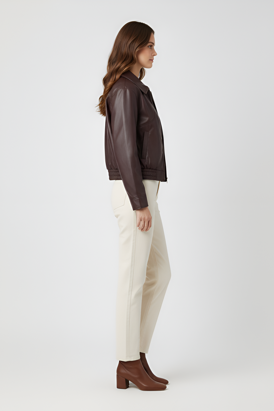 Front view model styling Dalvera brown cropped jacket zipped