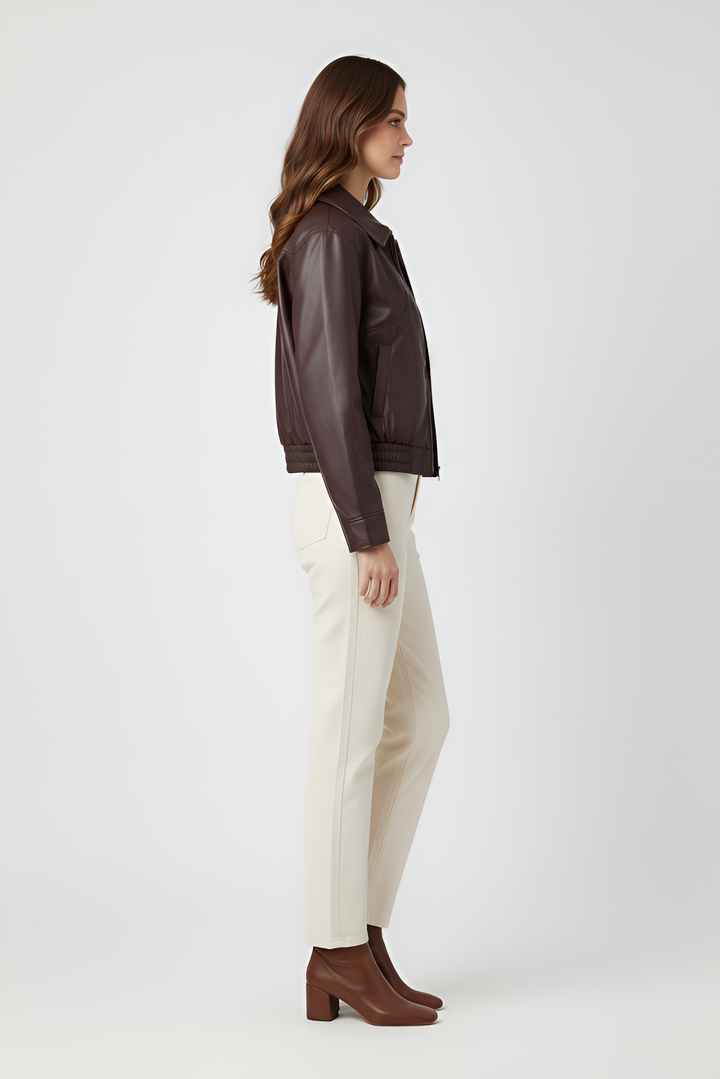 Front view model styling Dalvera brown cropped jacket zipped