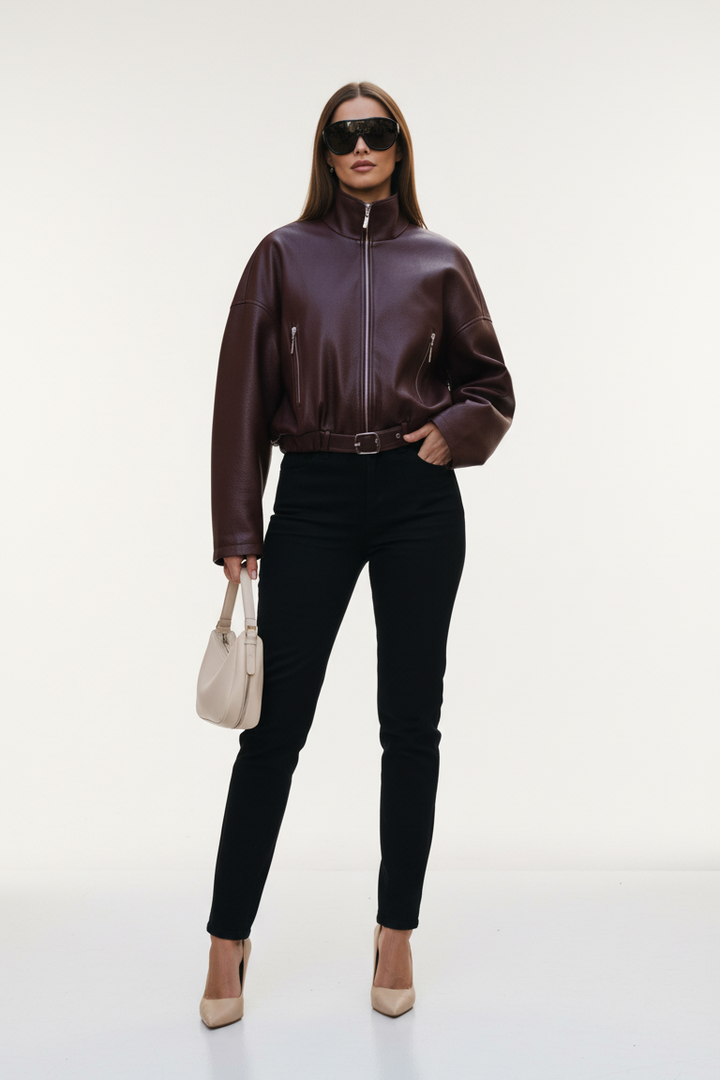 Front view of AVELON Faux Leather Bomber Jacket showing sleek faux leather finish and zipper closure.