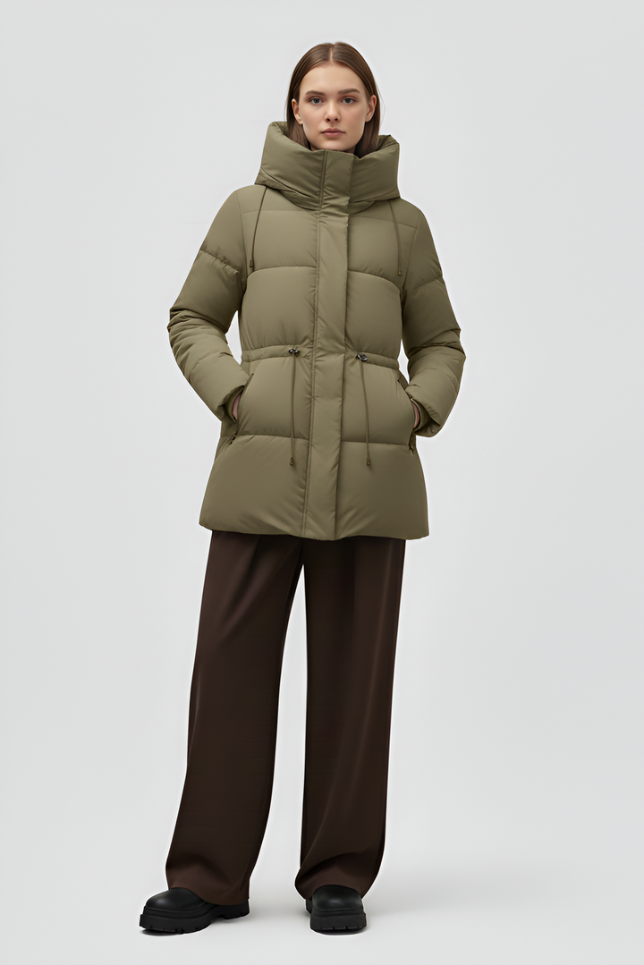 Green puffer coat on a white background