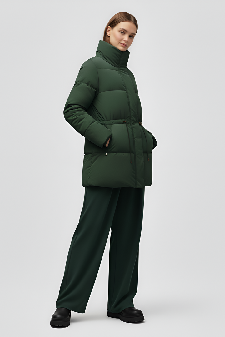 Green puffer coat on a white background