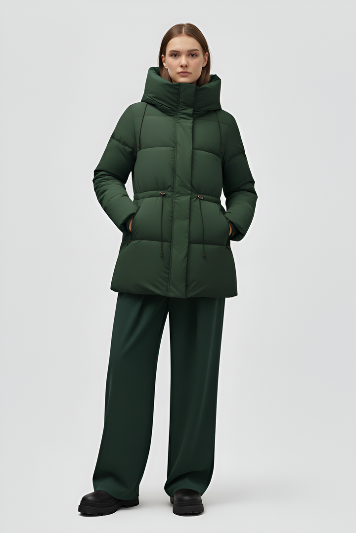 Green puffer coat on a white background