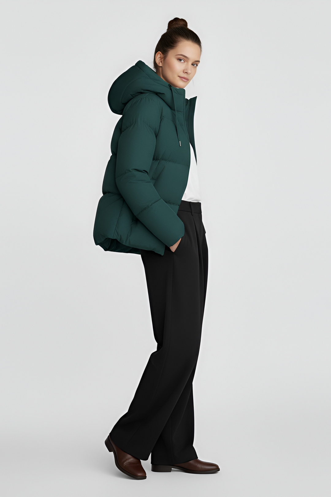 Green puffer jacket on a light gray background