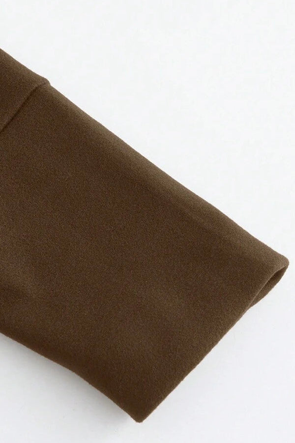 Detailed shot of HARLENE Wool Blend Double-Breasted Coat in tobacco color, showing soft woven fabric and refined tailoring.