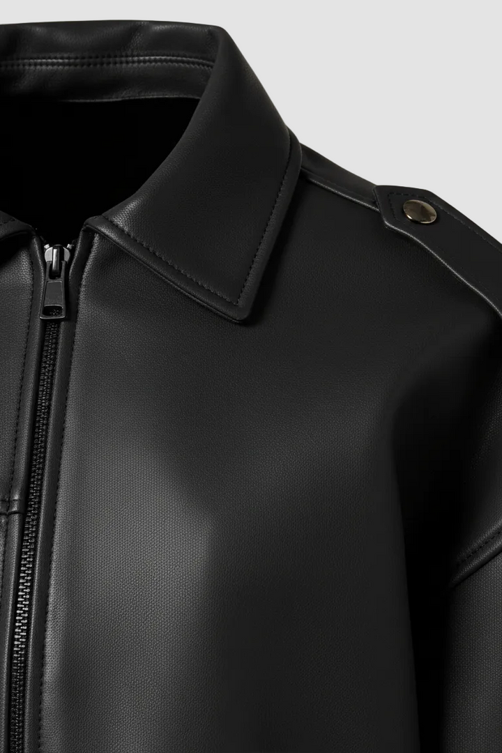 HOLLIS - Black faux leather motorcycle jacket, close-up of collar and zipper