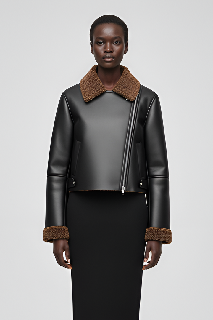 High-waist motorcycle-style faux leather jacket with textured fleece collar.