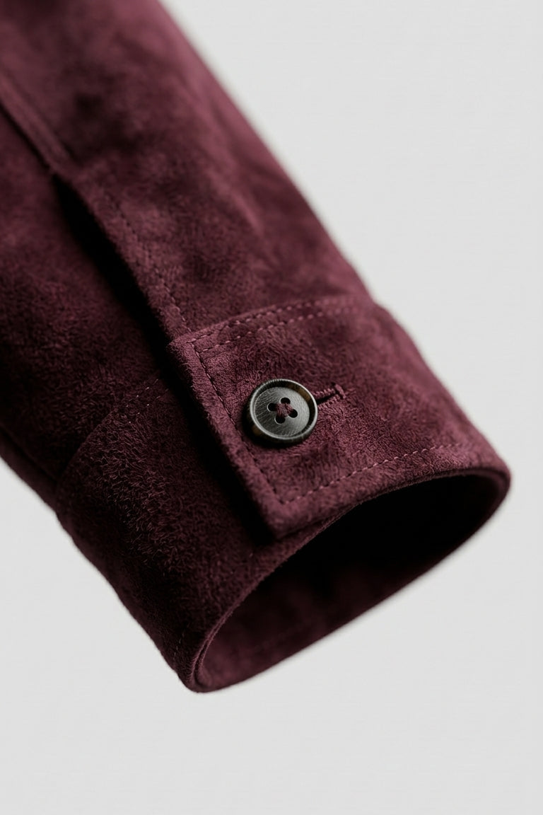 IVY - Close-up of burgundy suede jacket sleeve and cuff